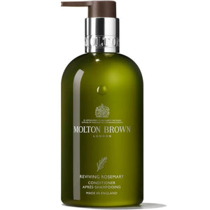 Molton Brown Acondicionador Revitalizante de Romero: botella elegante brinda nutrición y aroma vigorizante.
