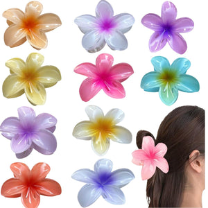 Ganchos flor plumeria Musaner para peinados veraniegos con agarre seguro.