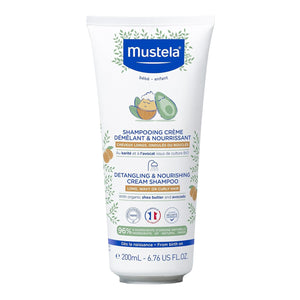 Mustela champú cremoso desenredante en botella, suaviza y desenreda el cabello.