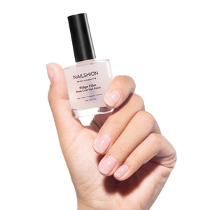 Nailshion Capa Base 3-en-1 para uñas más fuertes y lisas.