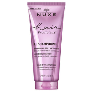 Nuxe Hair Prodigieux Shampoo, botella elegante, aporta brillo natural sin pesadez.