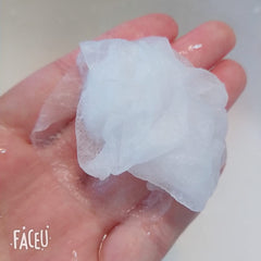 nykkola mascarilla de papel comprimido dentro del tónico, facilita preparación facial