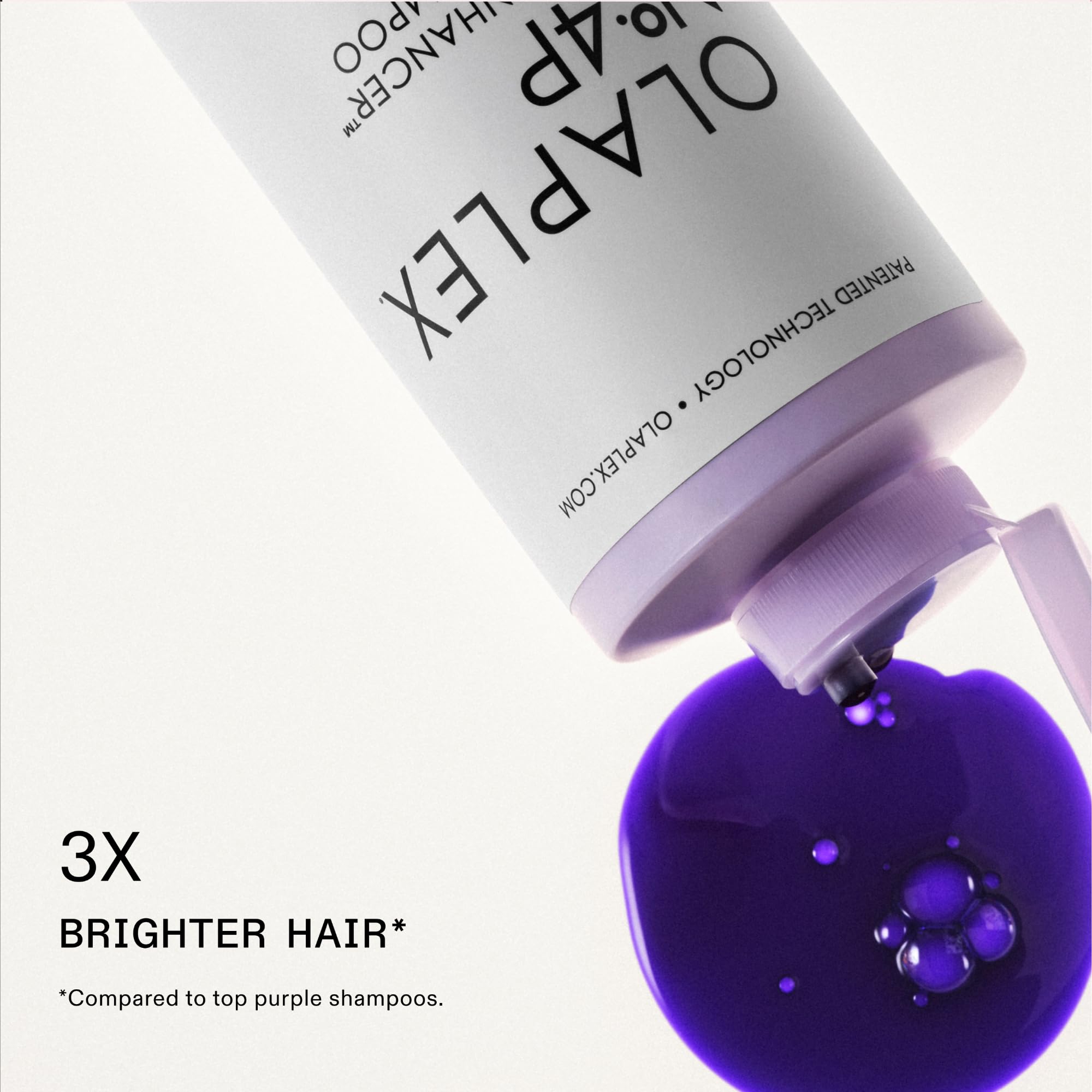 Olaplex 4P champú violeta, espuma cremosa, suaviza y neutraliza tonos cálidos del cabello.