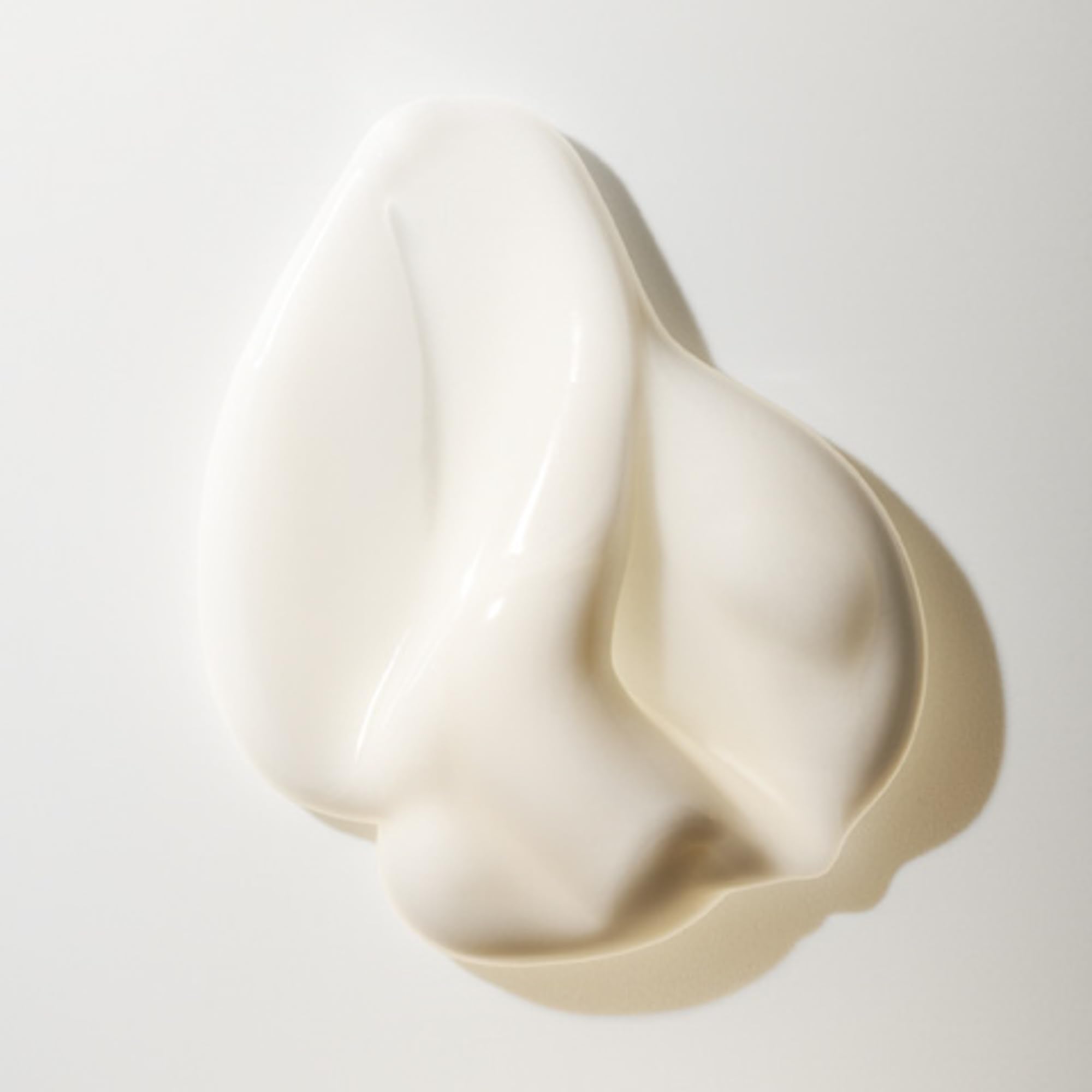 Oribe Alquimia: ingredientes clave manteca de karité y yacón para cabello nutrido.
