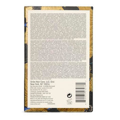 ORIBE Hair Alchemy bálsamo sin calor en tubo define y aporta brillo suave