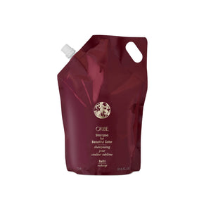 Oribe Shampoo para color: vertido de la botella para lavado suave y color protegido.