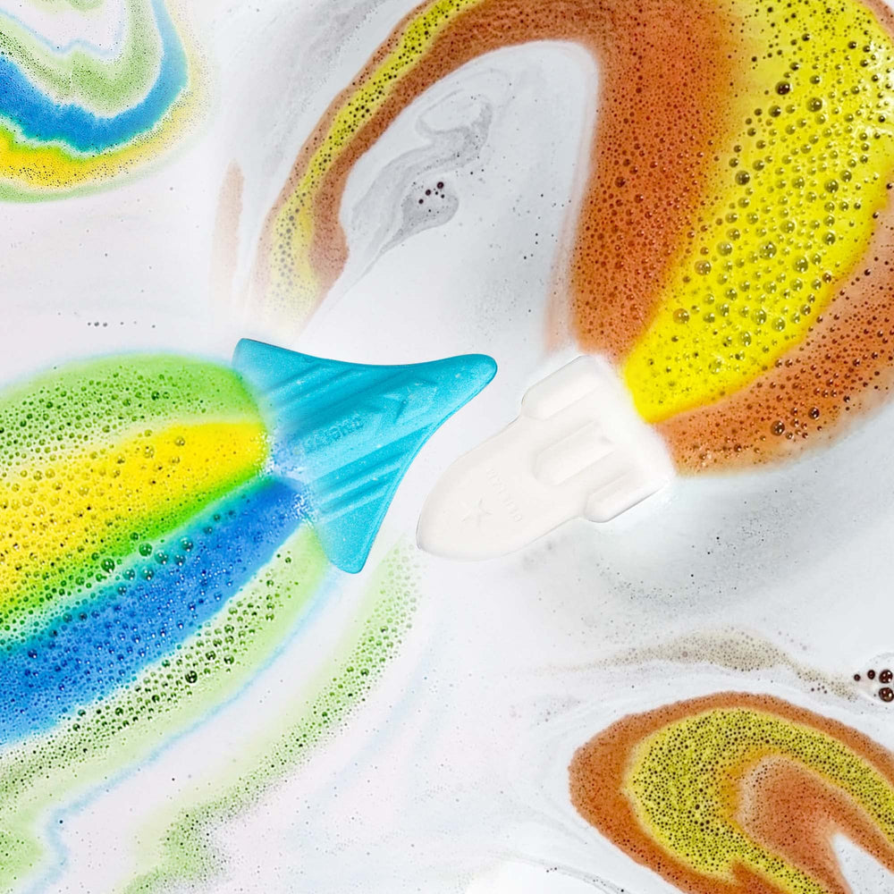 ORIGLAM bomba de baño para niños, avion espacial con burbujas y colores vivos.