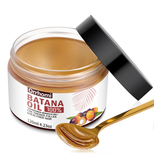 Orrhomi Batana Oil, botella prensada en frío para nutrición capilar y brillo natural.