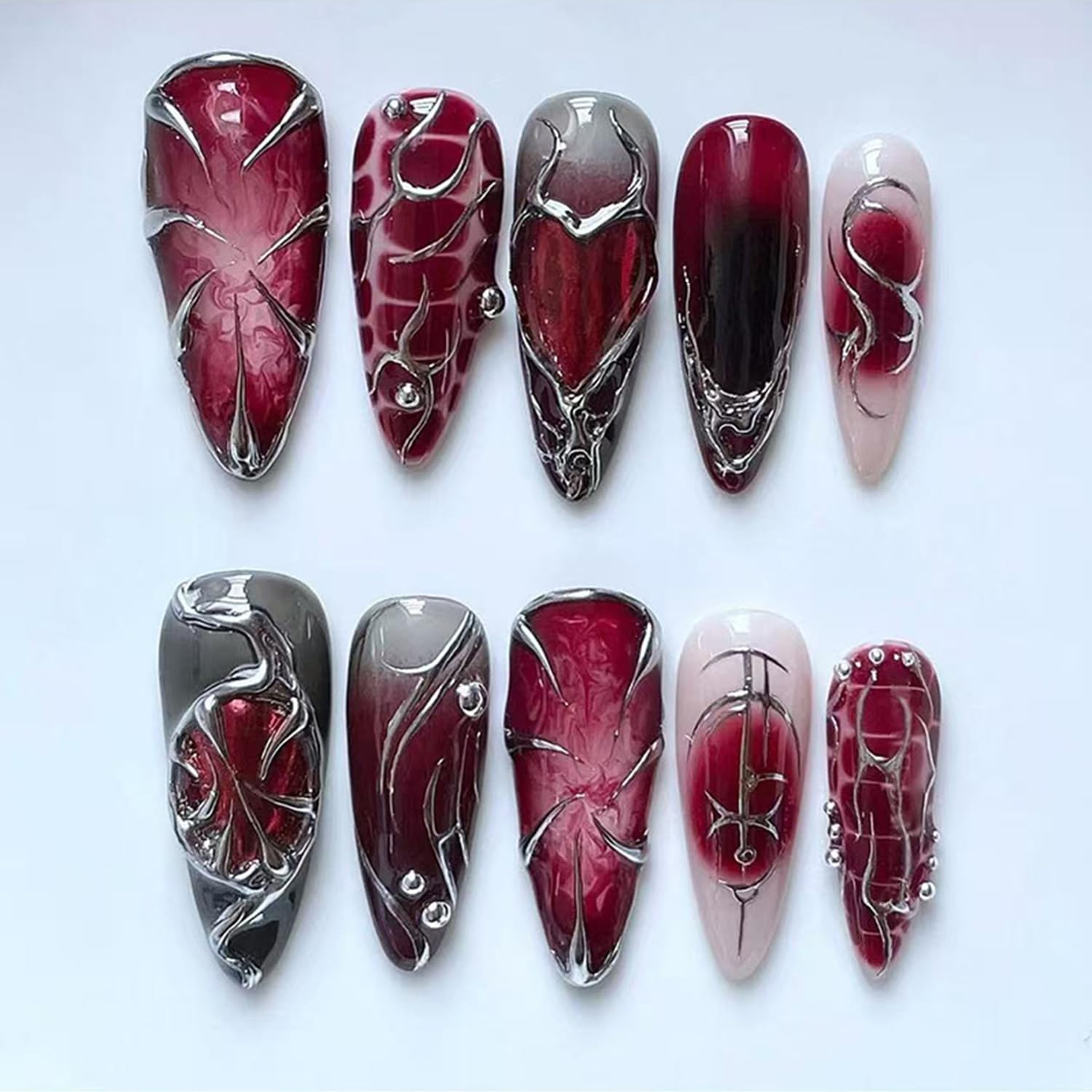 OSTTMA uñas metálicas largas para un look atrevido y manicura rápida en casa.