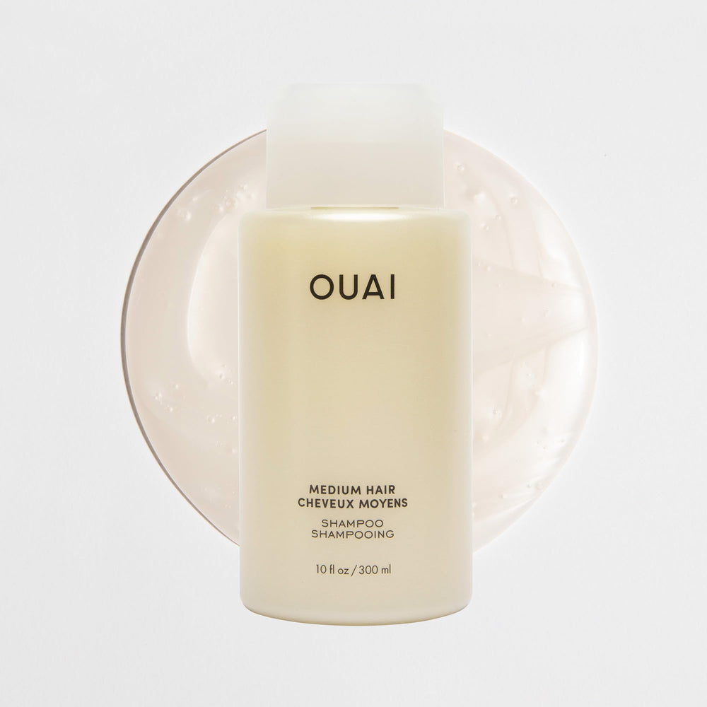 OUAI champú medio-botella-viaje-claridad: brillo suave sin sulfatos.