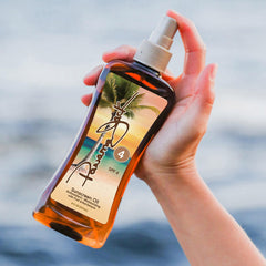Aceite bronceador sin gluten y libre de crueldad para la piel.