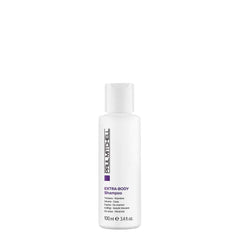 Paul Mitchell Extra-Body Shampoo vertido suave desde la botella para volumen