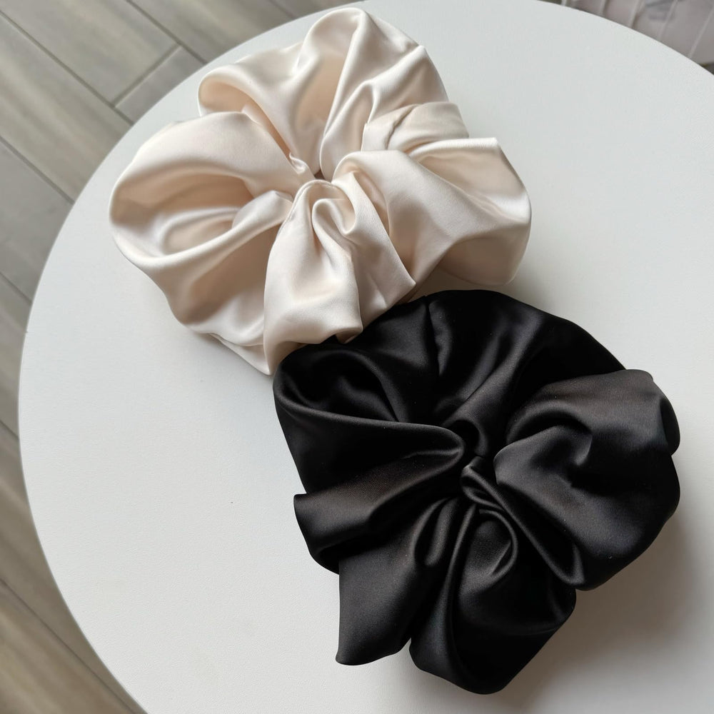 Paquete de dos gomas jumbo, versatilidad para diario y eventos.