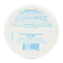 Pomada de la Campana con textura cremosa, ideal para suavizar piel seca y calmar irritaciones.