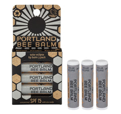 Portland Bee Balm Solar Eclipse balsamo labial, protege con SPF 15 en cualquier salida.