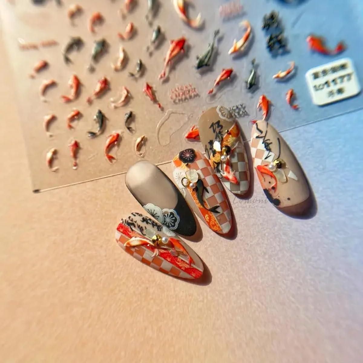 Diseños POWPOP flor y atrapasueños para uñas.