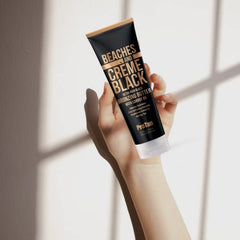 Pro Tan Beaches & Crème Black Butter, Carrot Root Oil nutre la piel.