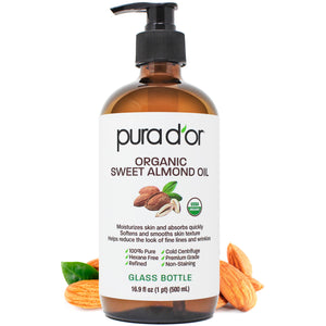 Aceite de almendras orgánico PURA D'OR en envase de vidrio para piel suave y nutrida.