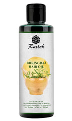 Raslok Bhringraj aplicado en cuero cabelludo para manejo suave.