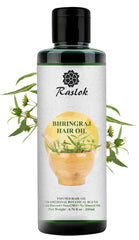 Raslok Bhringraj aceite en botella para cuidado capilar diario.