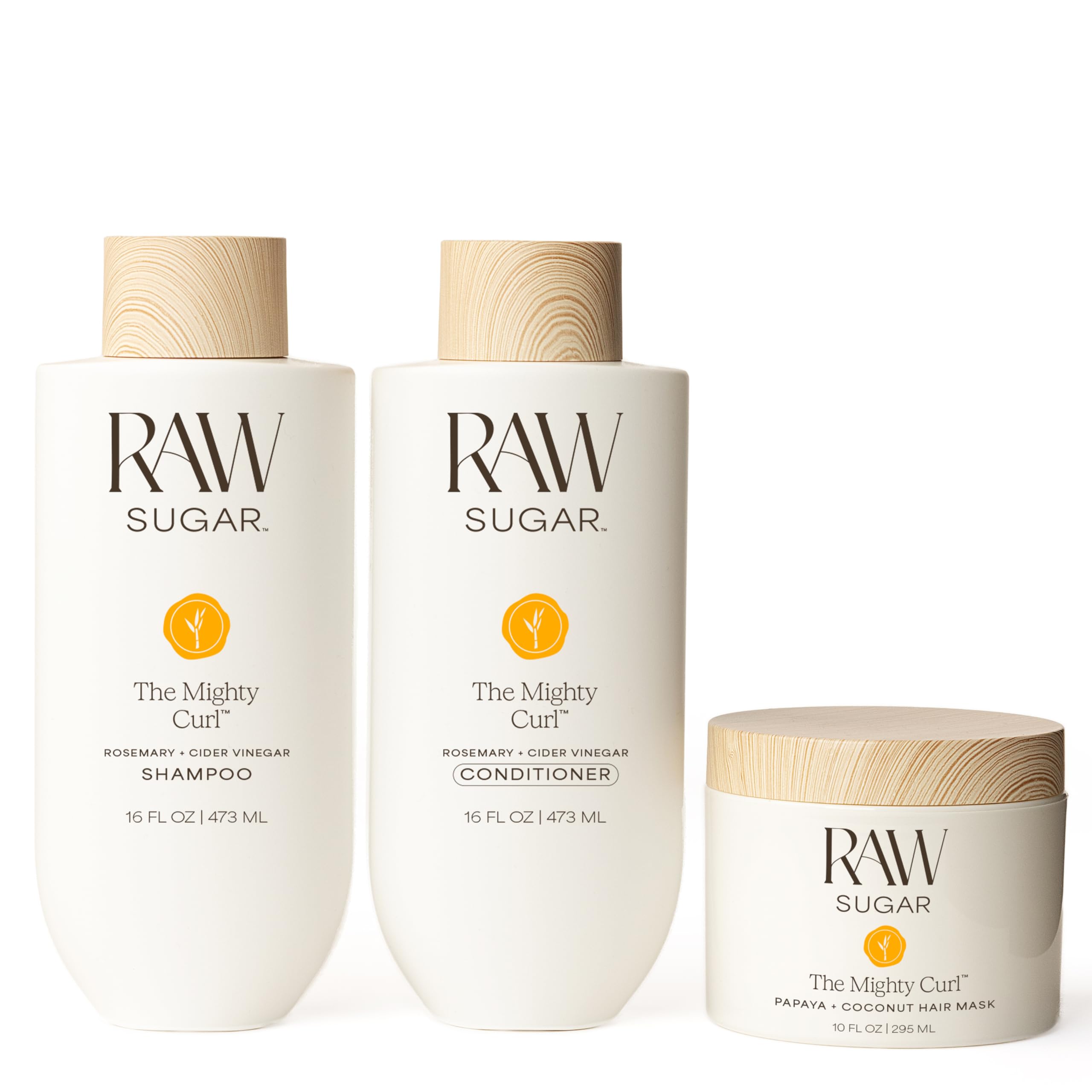 Raw Sugar Mighty Curl champú: botella visible, limpieza suave para rizos definidos.
