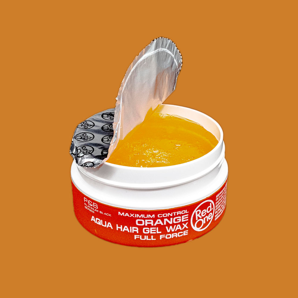 Aplicación suave de Redone Cera Naranja para peinado sin esfuerzo