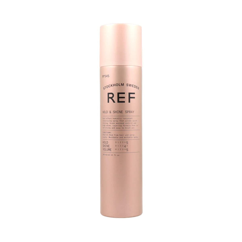 REF Hold & Shine Spray: botella texturizante que ofrece control y brillo duradero.