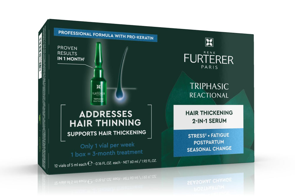 Frasco de René Furterer Triphasic Serum para preservar la vitalidad capilar.