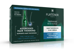 Frasco de René Furterer Triphasic Serum para preservar la vitalidad capilar.