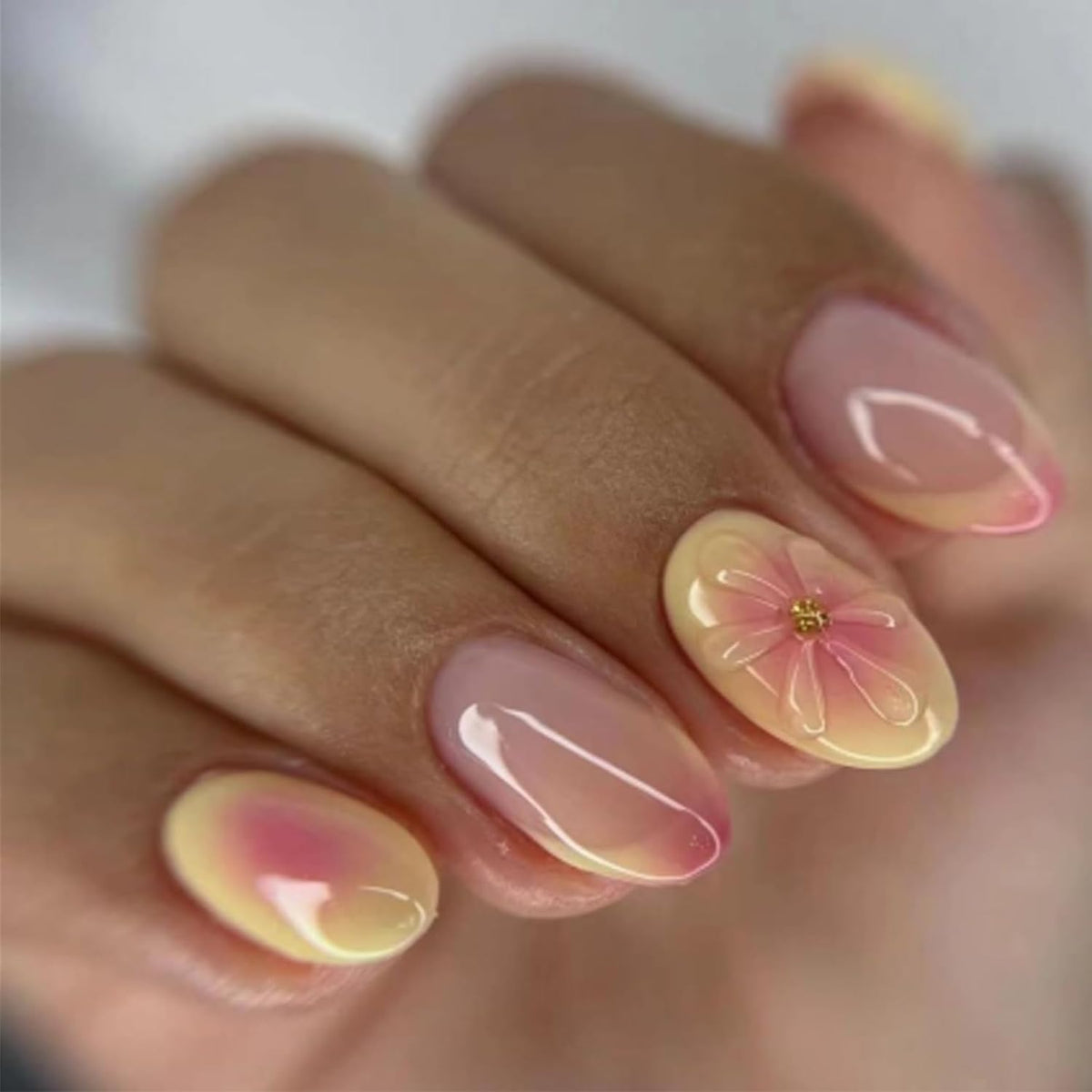RIICFDD puntas francesas cortas con flor, ideal para look diario.