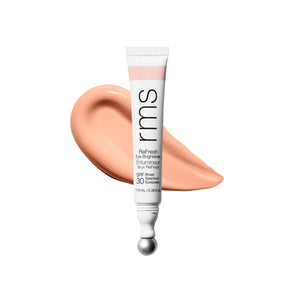 RMS Beauty Superbright Corrector de ojeras con rodillo metálico para refrescar y desinflamar la mirada.
