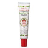 Rosebud bálsamo labial en tubo, textura cremosa, uso diario