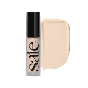 Saie Slip Tint Radiante Concealer, botella visible, cobertura suave para tono uniforme.