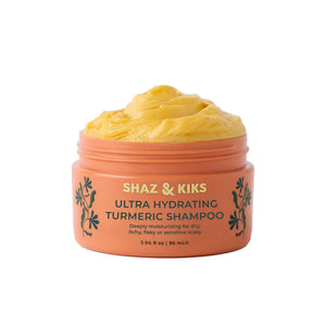 SHAZ & KIKS Champú Curcuma Ultra Hidratante en botella, ideal para cabello seco.