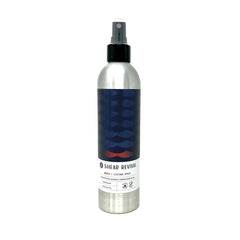Amity Aerosol de Textura de Shear Revival: botella enfocada para crear textura y volumen con acabado mate.