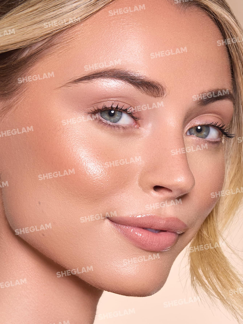 SHEGLAM Sun Beam bronceador líquido, acabado natural y duradero.