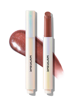 SHEGLAM Pout-Perfect labio brillo-violeta-fizz ofrece color intenso y acabado brillante.