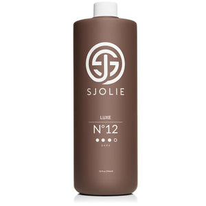 SJOLIE Solución de spray bronceador, botella vertida, guía para aplicación uniforme.