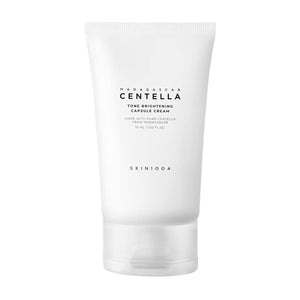 SKIN1004 Tono Brillo Capsula Crema, enfoque visual: textura suave que ilumina naturalmente.