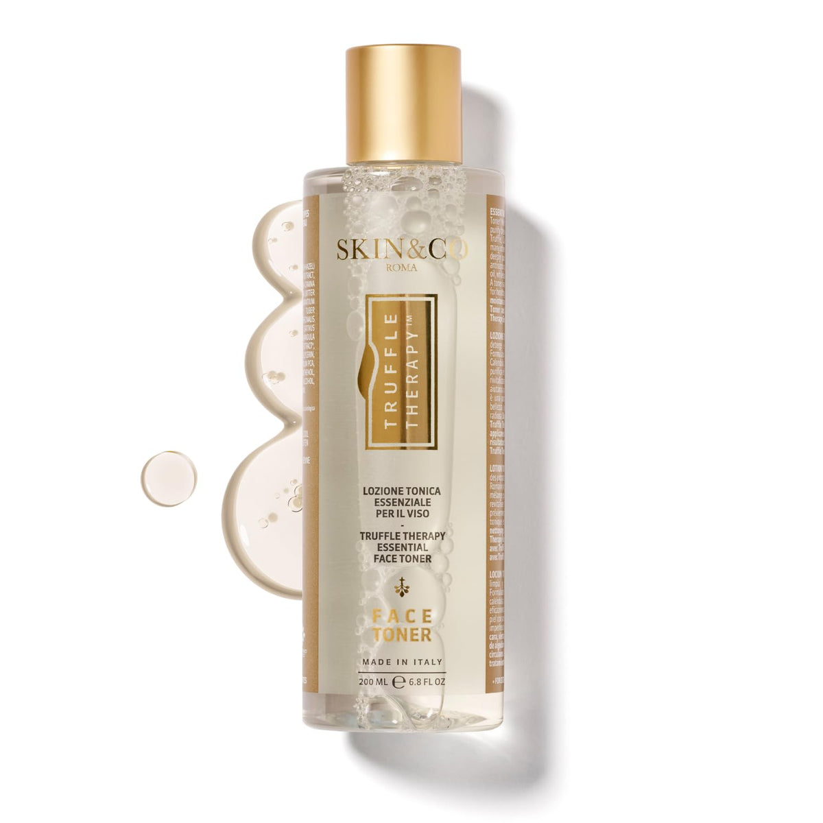 Tónico SKIN&CO Roma Trufa Terapia, botella elegante para purificar y refrescar la piel.