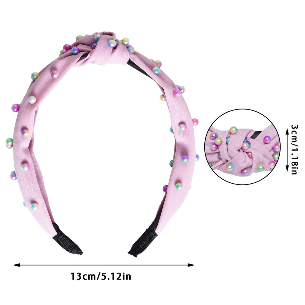 Diadema Sucrain de perlas azules con nudo, mantiene el cabello ordenado.