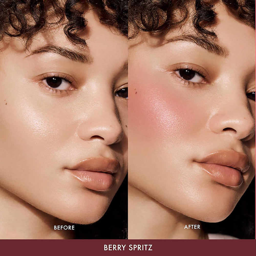 Empaque elegante de Berry Spritz que protege la fórmula hidratante.