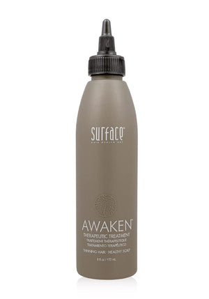Surface Hair Awaken: botella del tratamiento lista para uso diario en el cuero cabelludo.