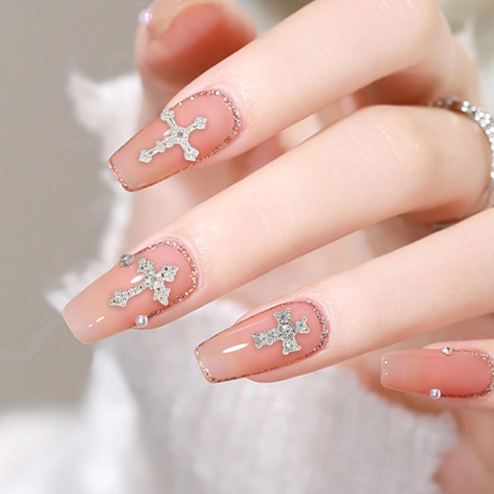 Detalles de cruz elegantes para uñas Symphonyw, toque sofisticado.
