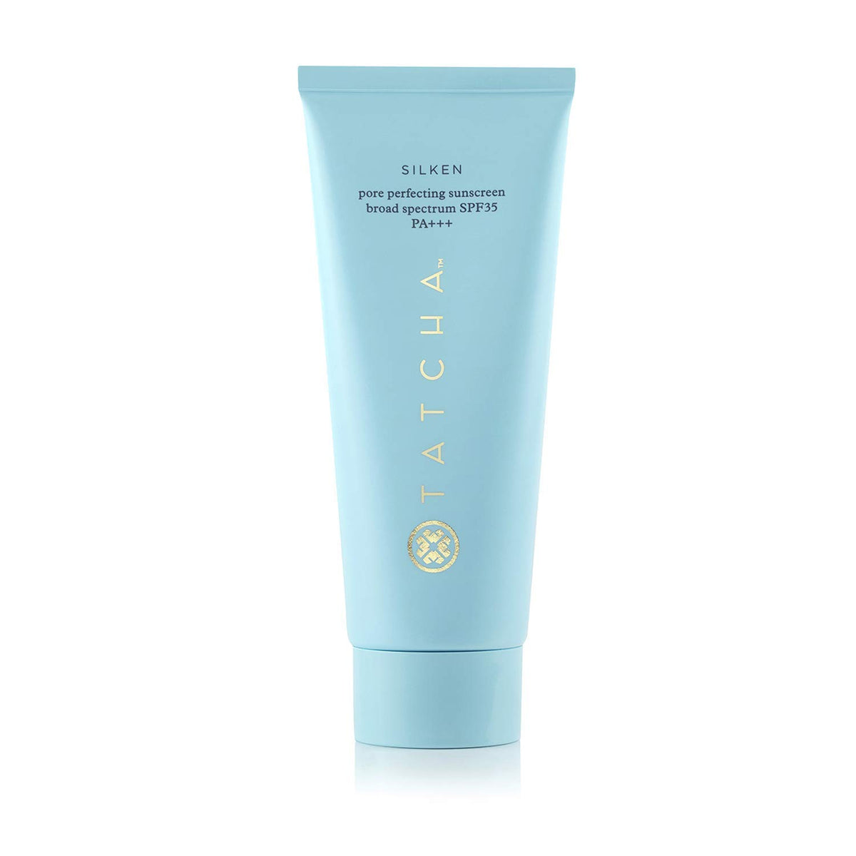 Tatcha protector solar sedoso en envase elegante para uso diario.