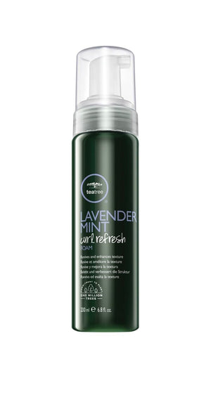 Tea Tree espuma refrescante para rizos: revitaliza volumen entre lavados.