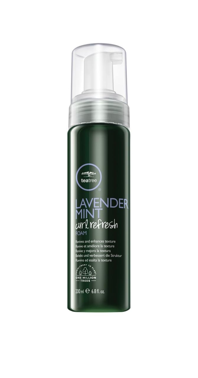 Tea Tree espuma refrescante para rizos: revitaliza volumen entre lavados.