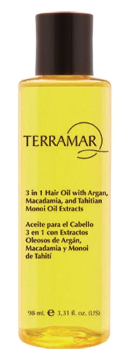 Terramar aceite 3 en 1 derramando desde la botella para suavizar y nutrir el cabello.
