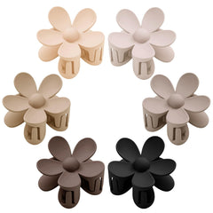 Tetizo clips de flores margarita ofrecen sujeción firme para cabello grueso en uso diario.