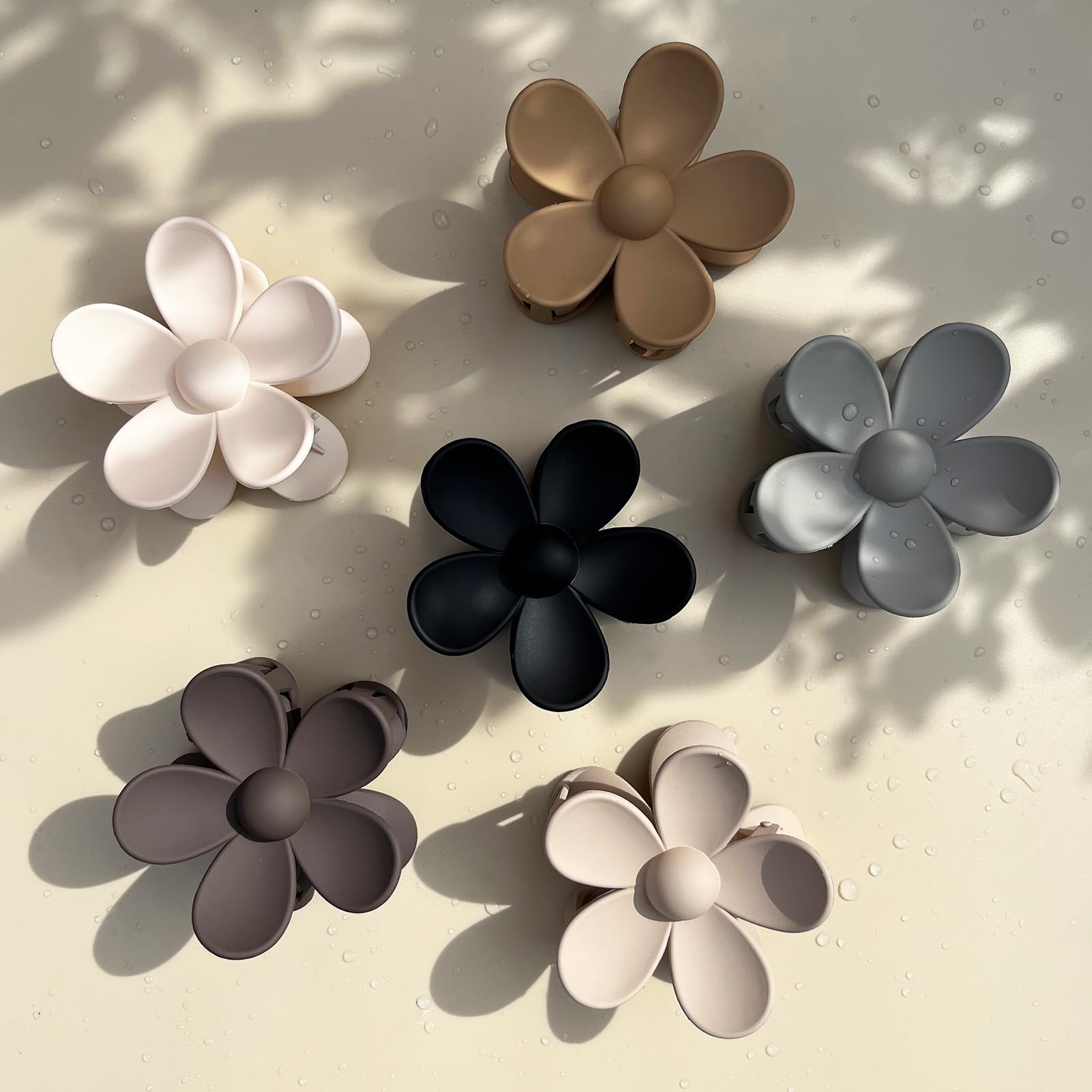 Tetizo clips de flores margarita: dientes entrelazados evitan caídas durante el uso.